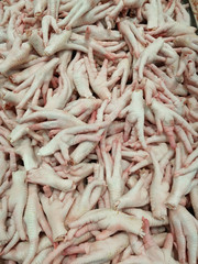 Chickens feet put it on the market for sale.