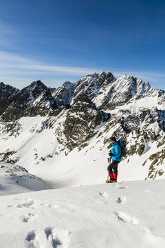 Hiker from Tatra ridge in the background.