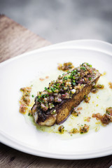 sea bass fish with mexican salsa sauce