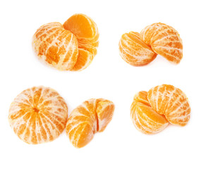 Two halves of fresh juicy tangerine fruit isolated over the white background