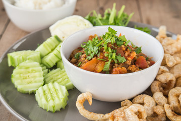 Nam Prik Ong , chili pork , Fried pork skin , Vegetable on woode