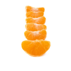 Slice sections of tangerine isolated over the white background