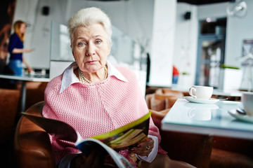 Senior woman in cafe