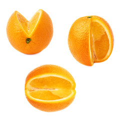 Fresh orange cut in slices isolated over the white background, set of different foreshortenings