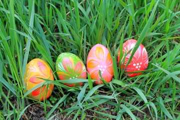 Easter eggs in the spring meadow 