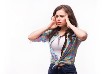 Young woman holding her head.Migraine and headache problem.Overworked,stressed woman.Menstrual and period pain.Intensive lifestyle and fast life.