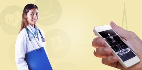 Composite image of asian doctor holding blue binder