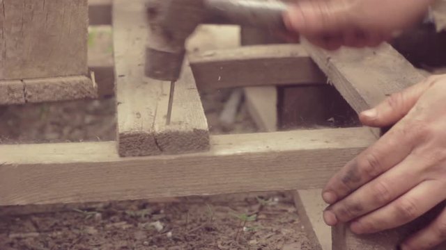 A nail pounded by the hammer.mov