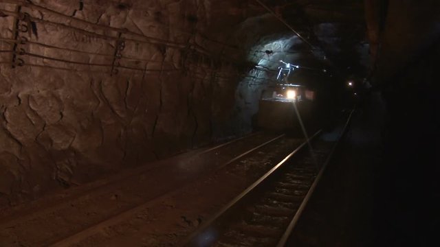 Trolley in the mine goes on rails