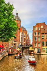 Fototapeta premium Canal in De Wallen district of Amsterdam