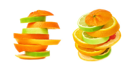 Fototapeta na wymiar Stack of citrus sliced fruits over white isolated background