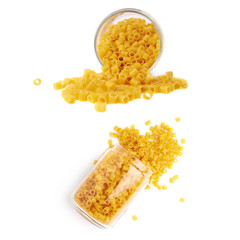 Set of glass jar filled with dry ditalini pasta over isolated white background