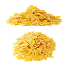 Pile of dry farfalle pasta over isolated white background