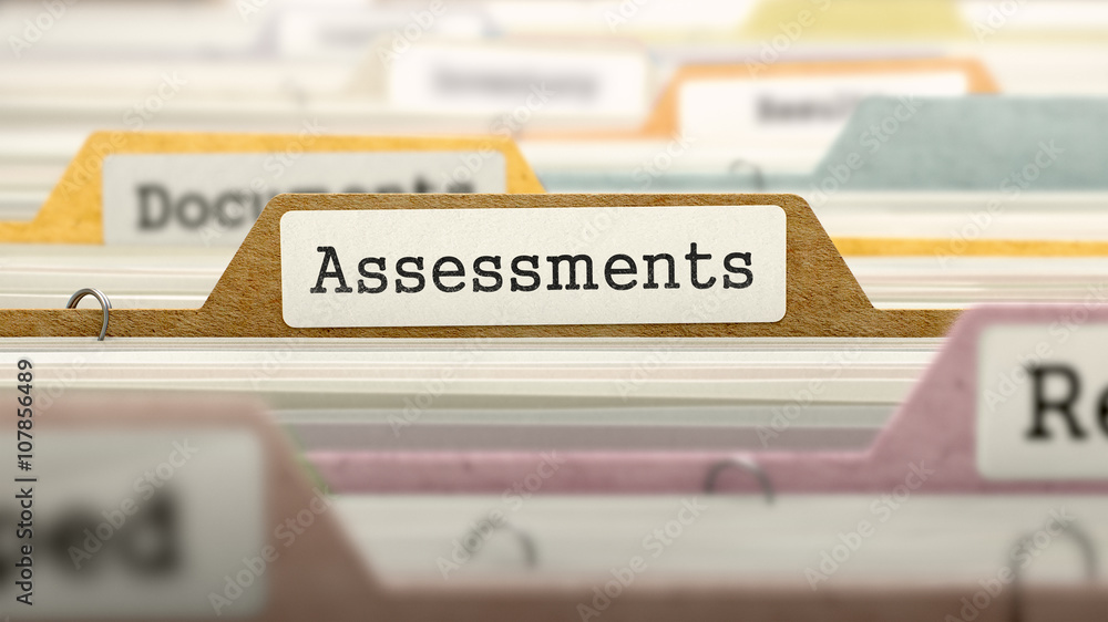 Poster folder in colored catalog marked as assessments closeup view. selective focus. 3d render.