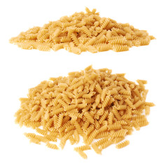 Pile of dry rotini pasta over isolated white background