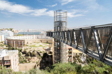 Fototapeta premium Ruins of ancient arena and modern elevator.