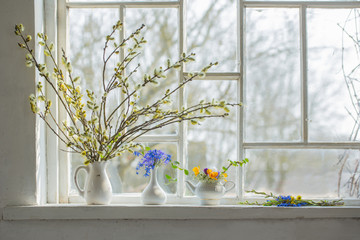 bouquet of flowers on the windowsill