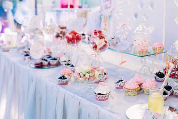 Dessert Sweet Tasty Cupcake In Candy Bar On Table. Delicious Swe