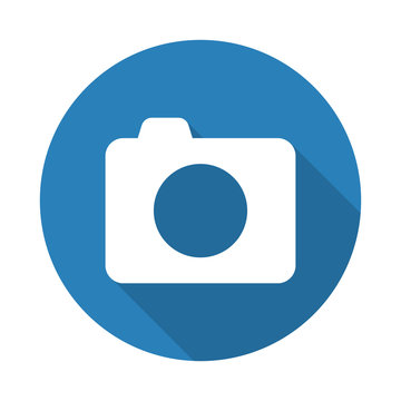 Flat white Camera web icon with long drop shadow on blue circle