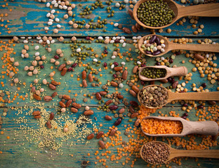 Raw legume on old rustic wooden table.