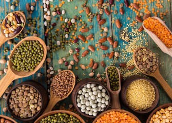 Raw legume on old rustic wooden table.