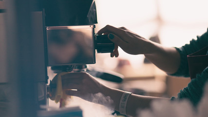 closeup of professional making coffee