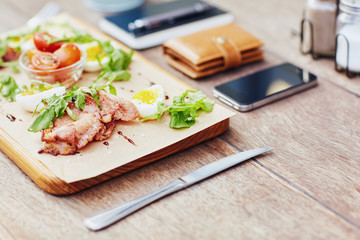 Platter of meats and salad on a table for lunch