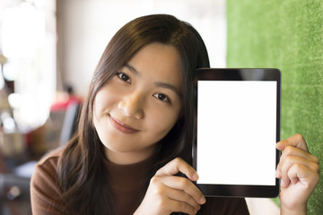 Woman show blank screen tablet