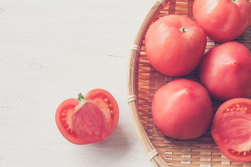 Fresh tomatoes , Whole and a half  on white background