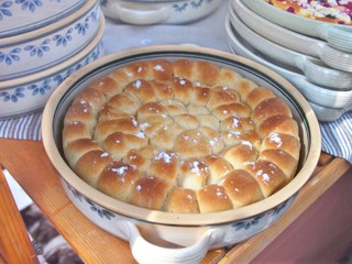 Traditional czech sugar buns (buchta, buchty) in an old decorated dish