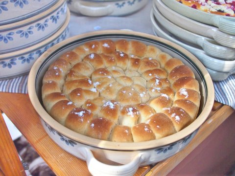 Traditional czech sugar buns (buchta, buchty) in an old decorated dish