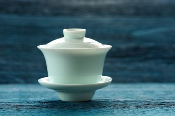 Aquamarine teaware on blue background