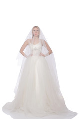 Fototapeta na wymiar Woman in wedding dress isolated on white