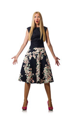 Woman in black floral dress isolated on white