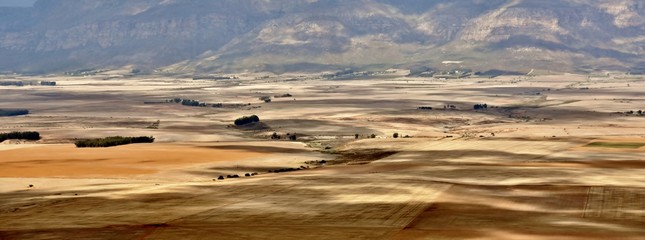Landscape with light and shadows on fields