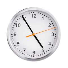 Office round clock shows almost five hours