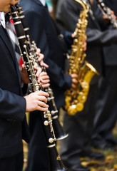group of musicians playing the clarinet.