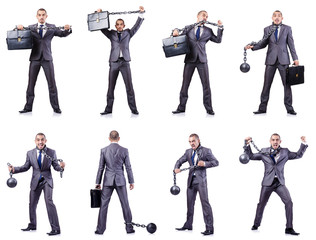 Businessman with shackles on white