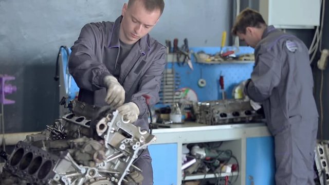 Man Working with Car Engine