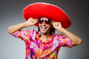 Young mexican man wearing sombrero