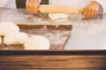 Composite image of high angle view of wooden flooring