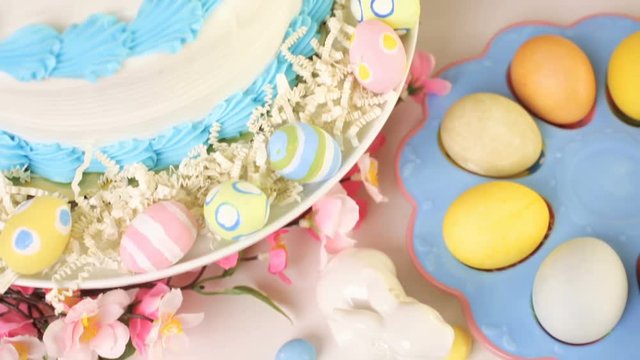 Dessert table set with cake and cupcakes for Easter brunch