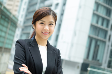 Businesswoman standing outside office