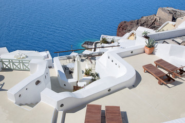 Fototapeta na wymiar Santorini - The luxury resorts in Oia and the Amoudi harbor.