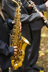 group of musicians playing the saxophone.