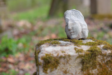 Part of a tombstone statue in cemetery