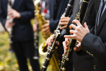 group of musicians playing the clarinet.