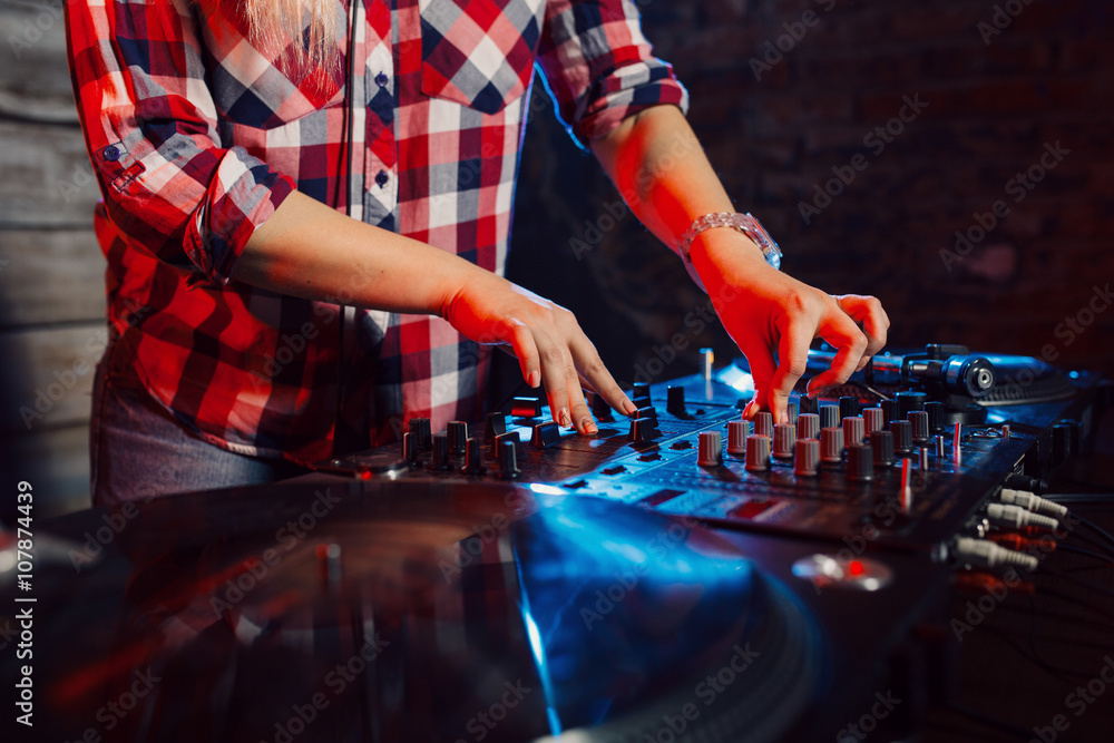 Wall mural cute dj woman having fun playing music at club party