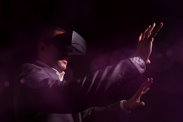Businessman wearing virtual reality goggles