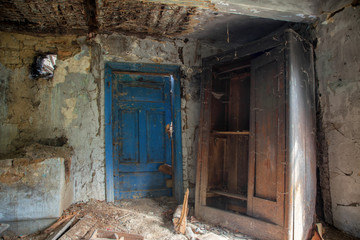 Fototapeta na wymiar Interior of abandoned and ruined house